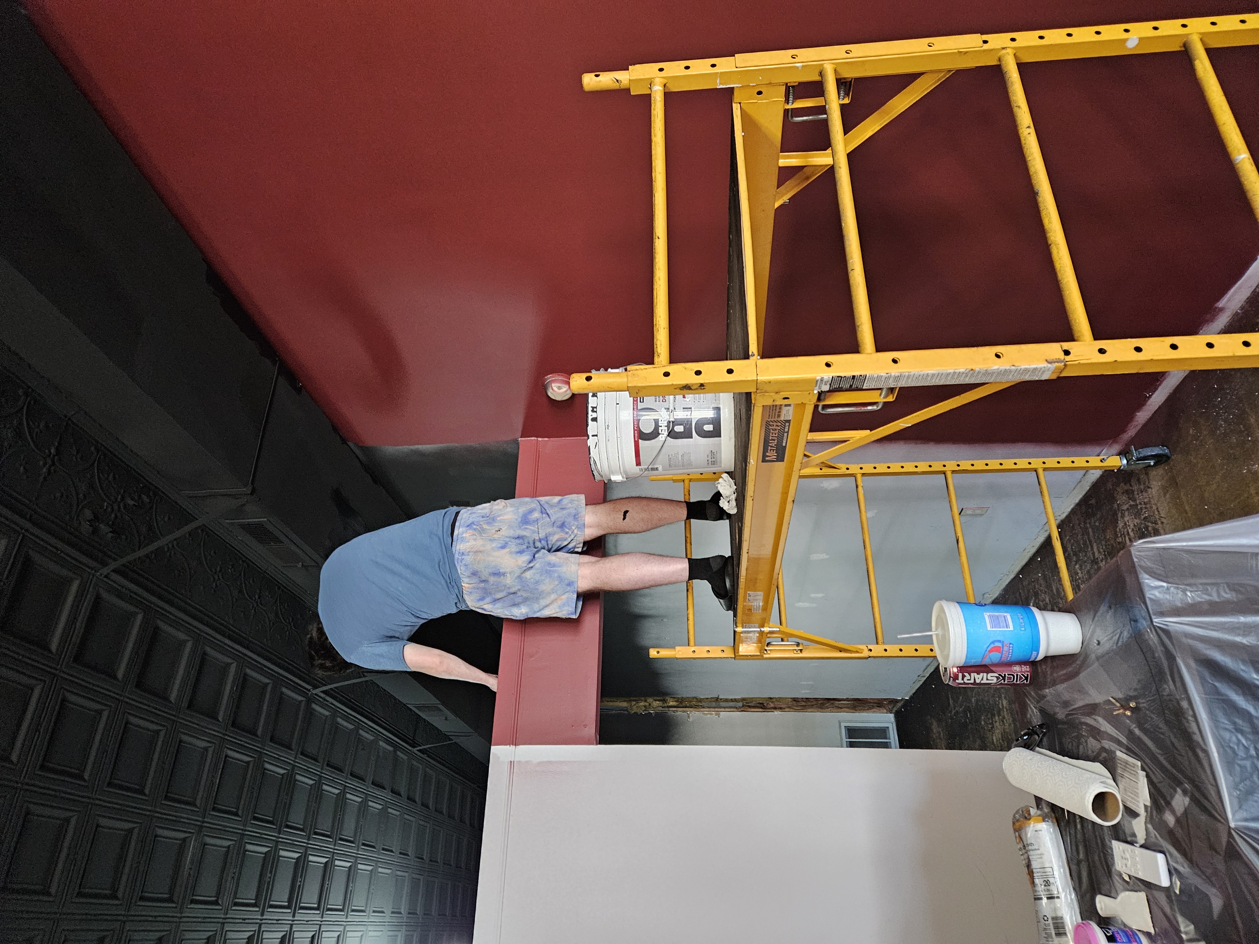 Griffin touching up paint