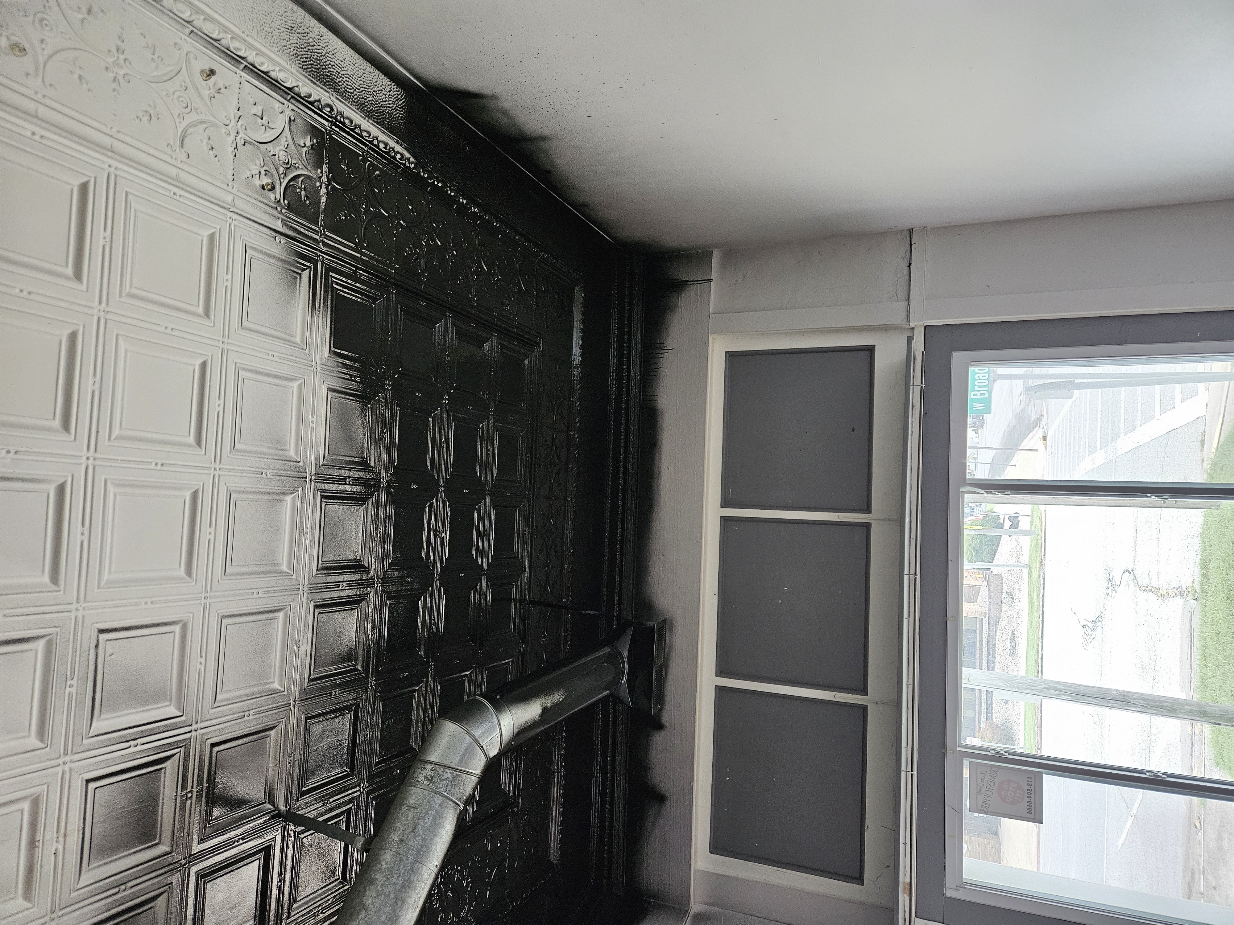Starting to paint the ceiling